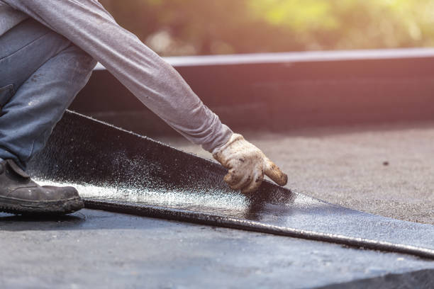 Professional Waterproofing technician working in Glenwood, MD